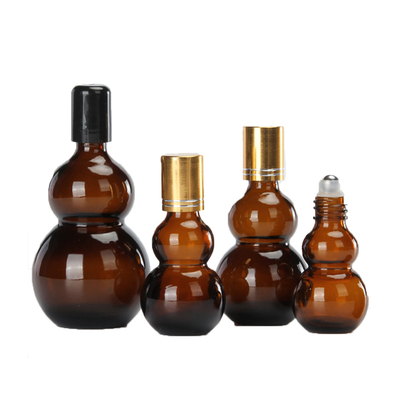 Venta al por mayor de botellas de aceite esencial de 10 a 100 ml de ámbar en forma de calabaza doble